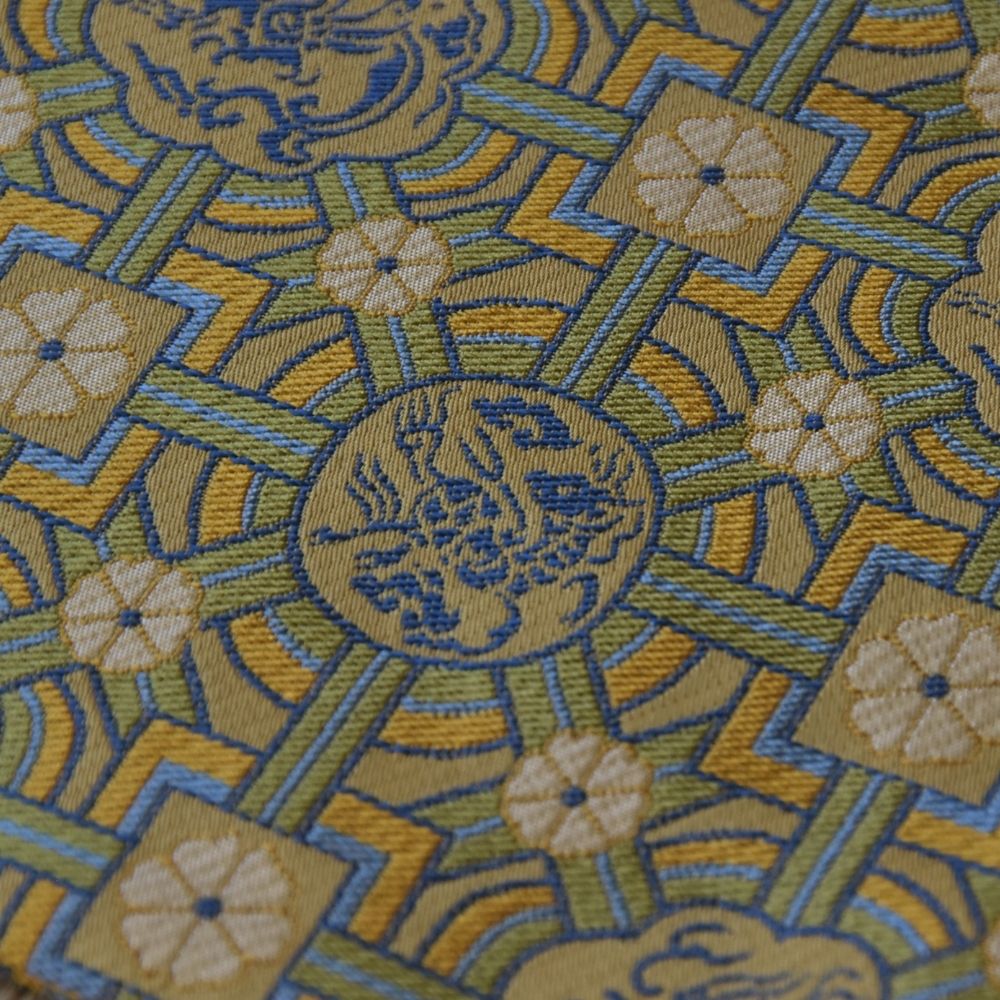 Close-up of qilin motif on a Japanese Nishijin silk kobukusa tea ceremony cloth