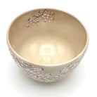 Top interior view of the Sakura matcha bowl showing cherry blossom branches continuing around the inner rim