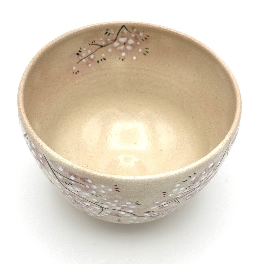 Top interior view of the Sakura matcha bowl showing cherry blossom branches continuing around the inner rim