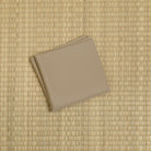 Sand beige silk fukusa displayed on tatami mat for Japanese Tea Ceremony