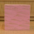 Pink presentation box with a repeating wave pattern included with the Sayaka Isaka Hina Matsuri matcha bowl.