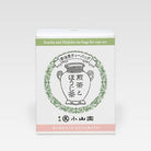 Tea package with Japanese text and a traditional teapot design on a white background