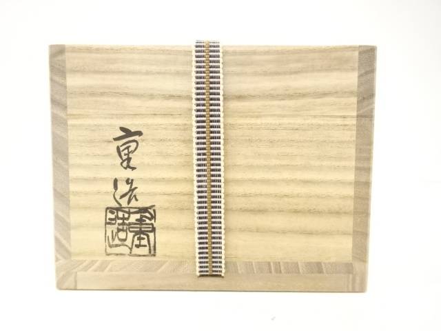 Exterior of the original wooden storage box with Japanese calligraphy, a woven securing cord, and a stamped mark for the Setsugekka chawan.