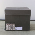 Outer gray storage box accompanying the pre-owned Shisen Asano Nadeshiko matcha bowl and its wooden hakogaki box