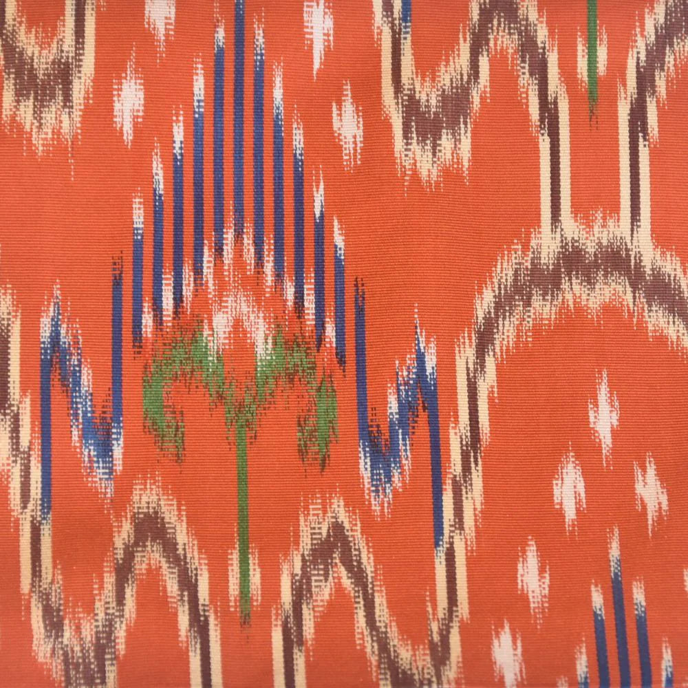 Textile with abstract pattern on an orange background