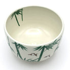 Top view of the Take Suzume matcha bowl showing bamboo and sparrow decoration continuing around the interior and exterior