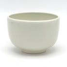Reverse view of the Take Suzume matcha bowl showing its simple rounded form and subtle bamboo decoration