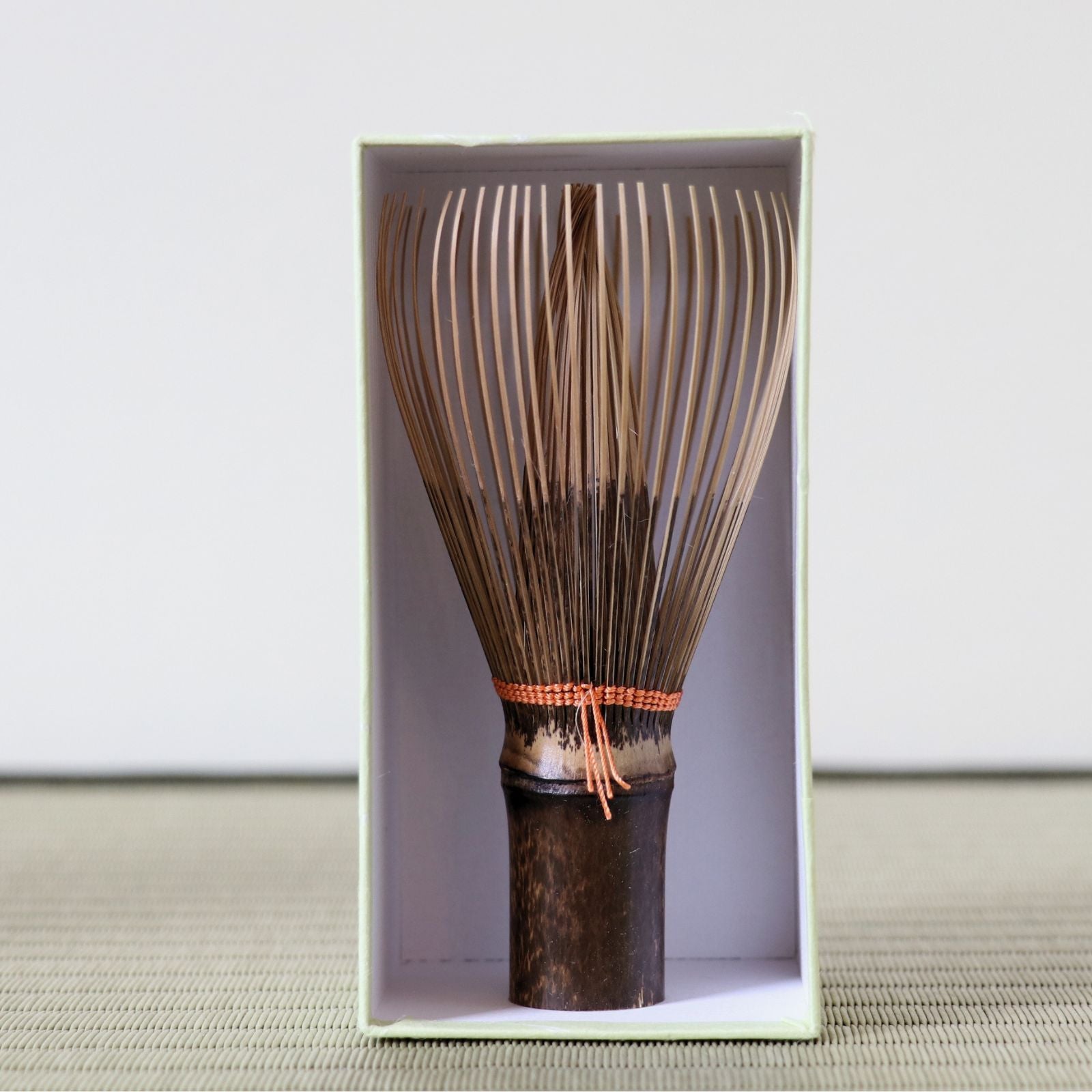 Handcrafted Japanese chasen by tea master Tango Tanimura, used for traditional matcha preparation