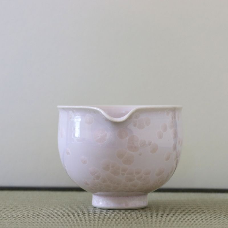 Spout view of the Tōan cherry blossom pink katakuchi matcha latte bowl highlighting the pouring lip and delicate Hana-Kesshō crystalline glaze