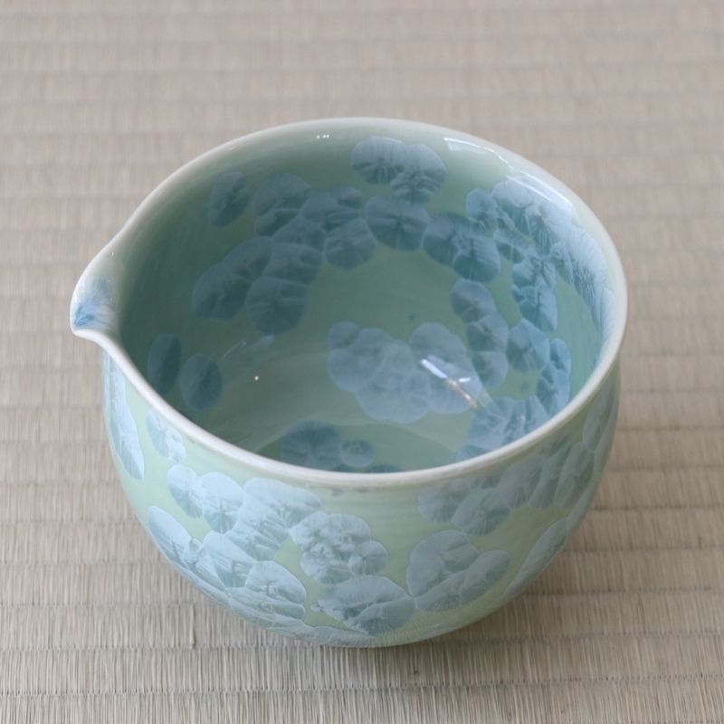 Top interior view of the Tōan Hana-Kesshō green katakuchi bowl showing the pouring spout and pale green flower crystal glaze continuing across the interior