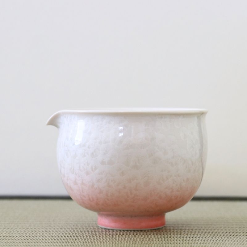 Tōan katakuchi matcha latte pouring bowl featuring a pink and white gradation with delicate Hana-Kesshō flower crystal glaze patterns