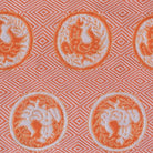 Detailed view of the Torimaru Kin Futsu rooster and diamond stone-pavement pattern in Kyoto Nishijin brocade used as a traditional fukusa cloth.