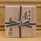 Wooden storage box tied with a blue and white cord for the Zensho Yamaoka Ryoma Sakamoto matcha bowl.